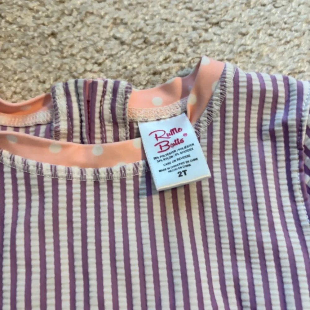 RuffleButts Toddler One-Piece Swimsuit Purple Stripe Peplum Size 2T